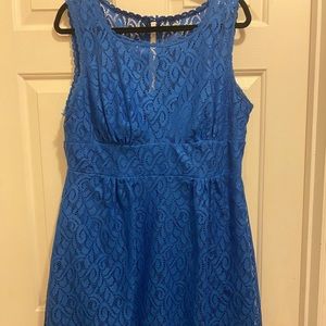 Lovely blue lace dress. Sleeveless and knee length. Fully lined. Hardly worn.